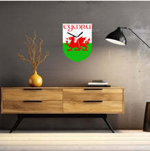 Load image into Gallery viewer, Flag Clock, Shield Shape Featuring The Flag of Wales, With CYMRU across the Top, 2 Sizes Available, Battery Included