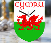 Load image into Gallery viewer, Flag Clock, Shield Shape Featuring The Flag of Wales, With CYMRU across the Top, 2 Sizes Available, Battery Included