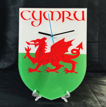 Load image into Gallery viewer, Flag Clock, Shield Shape Featuring The Flag of Wales, With CYMRU across the Top, 2 Sizes Available, Battery Included
